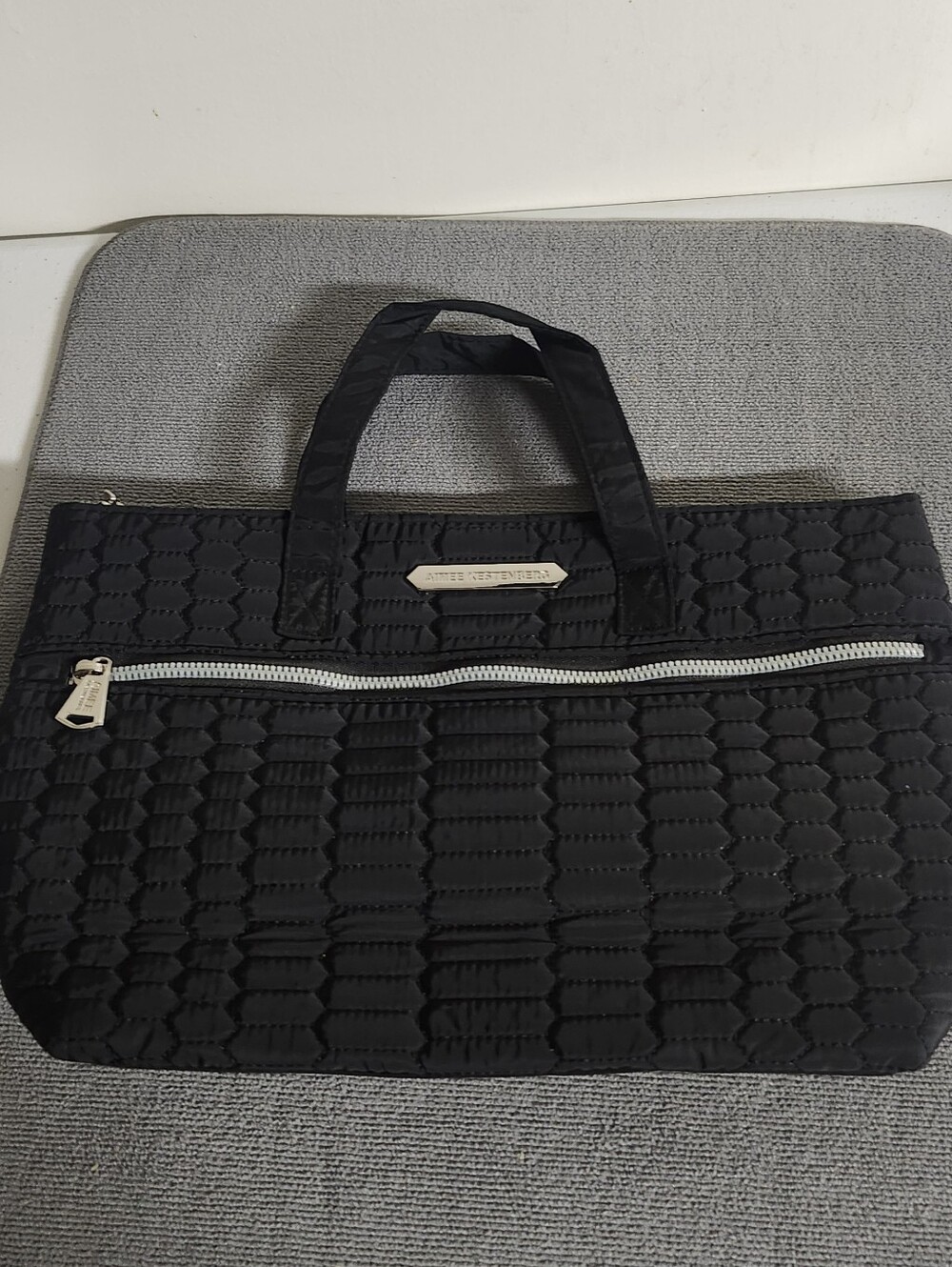 Anne Kestenberg Black Quilted Nylon Hand Bag with Front Zip Accent